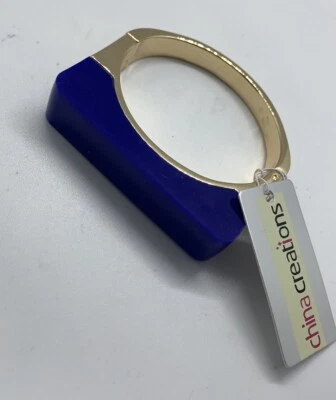 PULSERA $68 NUEVA CON ETIQUETAS TRINA TURK MUESTRA TONO DORADO Y AZUL REAL - JC302 C2 Foto 1 de 4