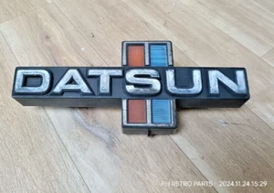 Datsun 720 Pickup Truck Emblem Badge Front Grill Genuine Used - Picture 1 of 8