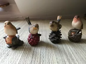 Set of 4 Bird Figurines Sitting Atop Pinecone Berry Chestnut Flower Polyresin 3" - Picture 1 of 11