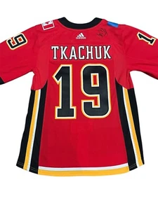 Matthew Tkachuk Calgary Flames Jersey.  Adidas Size 46. Signed By Theo Fleury. - Picture 1 of 10