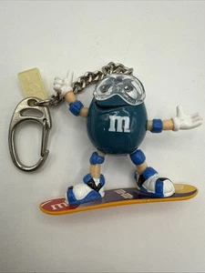 RARO LLAVERO BÁSICO DIVERTIDO M&M'S SNOWBOARDER - LLAVERO AZUL M&M - Imagen 1 de 2