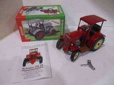SCHLÜTER DS 25 Tractor with Roof- NEW IN BOX-Wind-up-3 Forward Gears- - Imagem 1 de 4