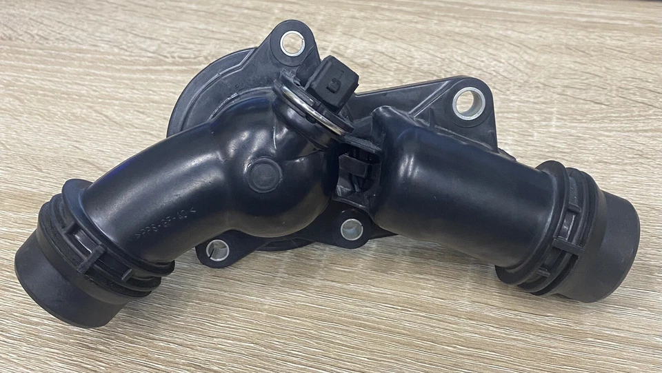 Termostato de refrigerante de motor para vehículos BMW Serie 3/5 1999-2006, X 3/5, Z3/4 Foto 1 de 4