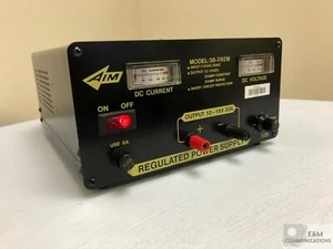 38-392M AIM REGULATED POWER SUPPLY 115 VAC 60HZ 12-15 VDC TESTED - Picture 1 of 4