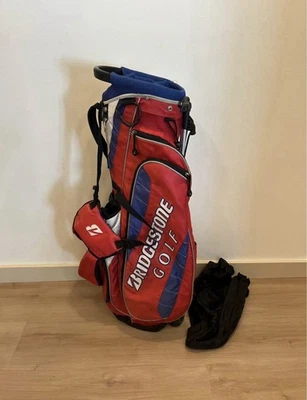 Bolsa de pie ligera Bridgestone Golf Tour divisor de 4 vías con cubierta de lluvia rojo azul Foto 1 de 4