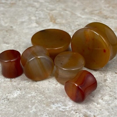 Par de medidores de tapones de doble llamarada de piedra de cornalina Foto 1 de 4