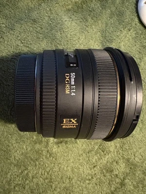 Lente Sigma 50mm f1.4 ex dg hsm compatível com Canon - usada, bom estado - Imagem 1 de 4
