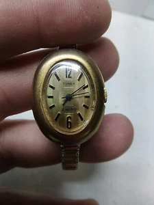 Reloj analógico de cuarzo vintage Timex eléctrico tono dorado 23 mm para reparaciones - Imagen 1 de 5