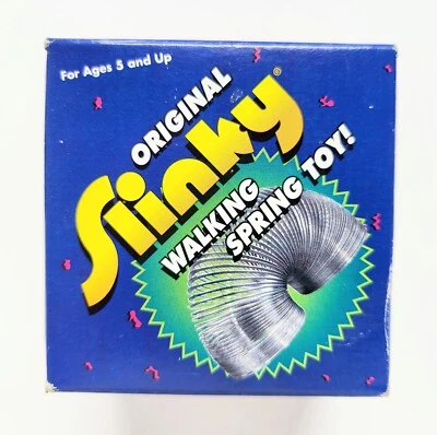 Juguete de resorte para caminar Slinky de metal original de colección 2000 oficial nuevo sellado sin usar Foto 1 de 4