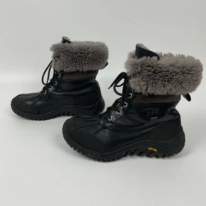 Botas de invierno impermeables forradas de piel de oveja negras Ugg Adirondack ll para mujer 8 - Imagen 1 de 16