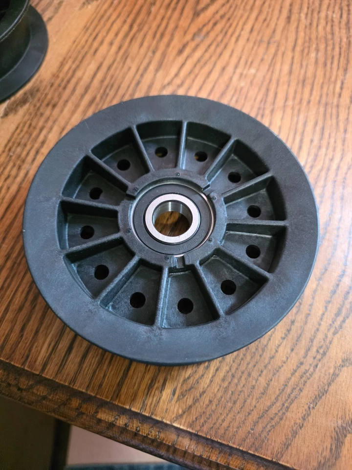 EXMARK 109-8891 IDLER DECK PULLEY 109-3658 QST22BE482 QST23KC482 - Image 1 of 2