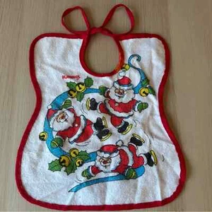 Vintage Playskool, Papá Noel, patinaje sobre hielo, babero de bebé espalda de plástico - Imagen 1 de 4