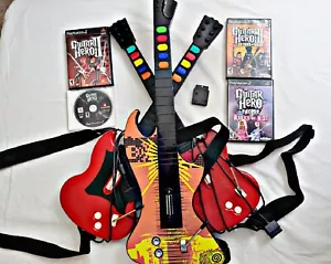 Guitar Hero PS2 Bundle: 2x Red Octane Guitars, 1 Wireless Guitar, 4 Games TESTED - Picture 1 of 12