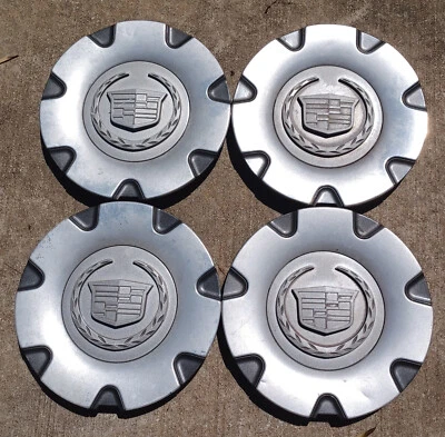 Cadillac SRX center cap set of 4, 2004-2006 part number 9594307 - Image 1 of 3