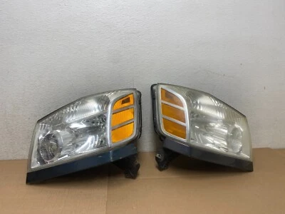 Juego de faros laterales izquierdo+derecho Nissan Armada 2004 a 2007 OEM M4613 DW Foto 1 de 4