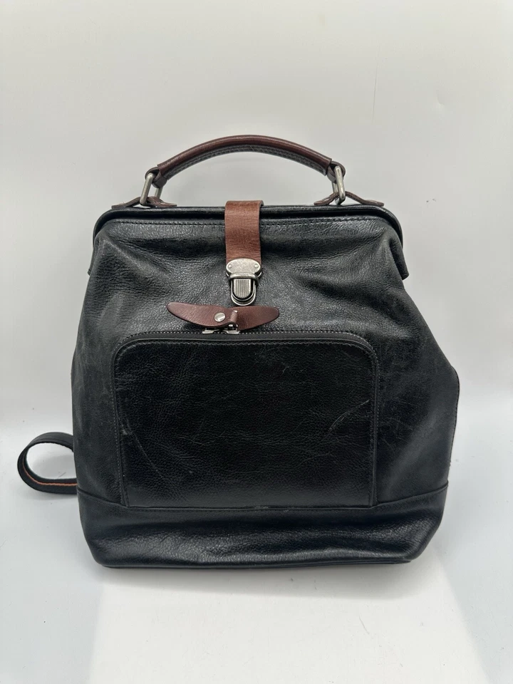 Mochila Springstep L’Artiste negra de cuero envejecido con adornos marrones Foto 1 de 4