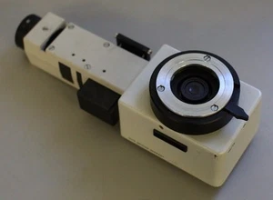 Leitz Wetzlar AF Mikroskop vertikale Beleuchtung (∞/1X) Aufsatz 563343 - Bild 1 von 1