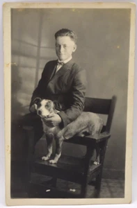 Antique - c1920 RPPC - Man Sitting with Terrier Dog - Real Photo - Old Chair - Picture 1 of 2