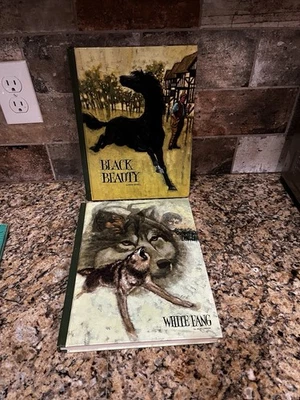 Juego de 2 libros de tapa dura de belleza negra y colmillo blanco para educador clásico Foto 1 de 4