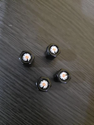 New 4 pieces Black Universal Tire Valve Stem Caps Flower Tire Caps Free Ship - Image 1 of 4