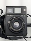 Polaroid 600SE mit Mamiya 127 mm f/2,7 und Polaroidrückseite