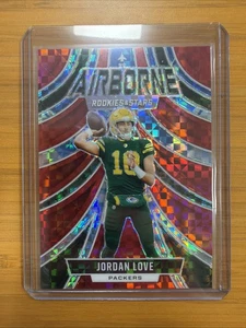 Panini Rookies & Stars 2024 - Airborne Jordan Love #A-JLE Red Plaid - Imagen 1 de 2