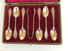  Decorative solid silver hallmarked boxed teaspoons and sugar tongs