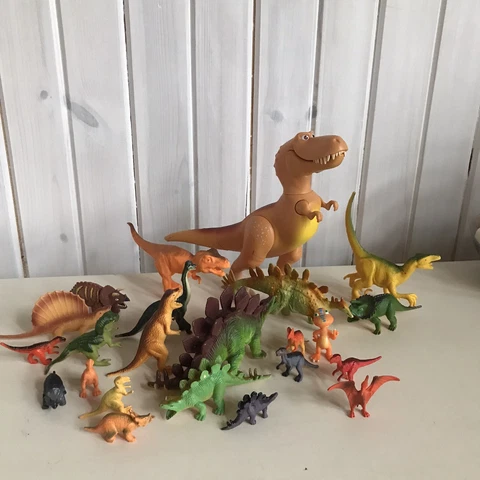 dinosaurs animals figures play animals toys Cover