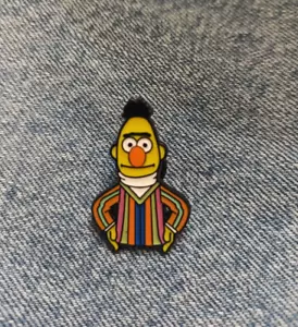 BERT-"SESAME STREET"- ENAMEL PIN-UNBRANDED-SHIP ALL THE PINS YOU BUY FOR $4.99 - Picture 1 of 2