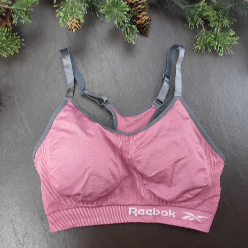 Sujetador deportivo Reebok L rosa ligeramente acolchado suéter inalámbrico Foto 1 de 4