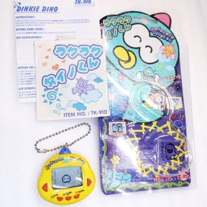 Rakuraku Dinokun Yellow Dinkie Dino TK-910 mit englischem Handbuch auf Lager - Bild 1 von 9