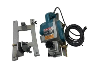 Cepilladora eléctrica portátil Makita modelo 1100 con colgador de pared - Imagen 1 de 14