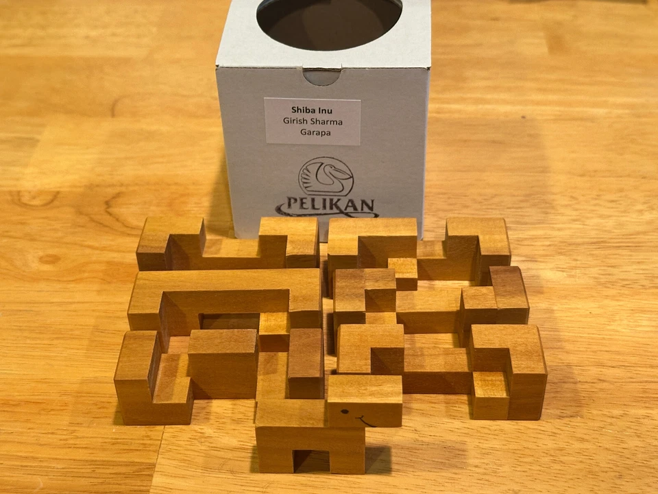 Shiba Inu Girish Sharma Pelikan wood burr puzzle - Image 1 of 1