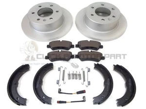 VW CRAFTER REAR 2 SOLID BRAKE DISCS AND PADS & HANDBRAKE SHOES + FITTING KIT - Picture 1 of 1