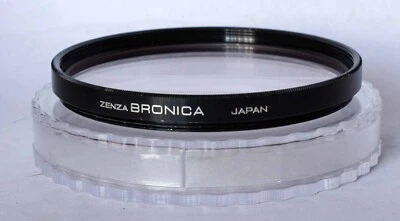 Bronica 67mm skylight 1B filter in twist lock case. - Image 1 of 3