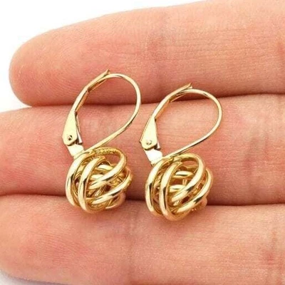 Pendientes de oro amarillo de 14 quilates con nudo de amor y gota de oro blanco de 10 mm Foto 1 de 4
