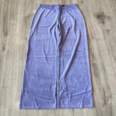 Pantalones deportivos holgados morados Moda International para mujer talla mediana pierna ancha Foto 1 de 4