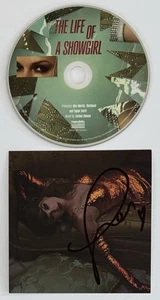 FOTO FIRMADA RARA HEART TAYLOR SWIFT LIFE OF A SHOWGIRL #2 Y CD CERTIFICADO DE AUTENTICIDAD BAS BECKETT - Imagen 1 de 5
