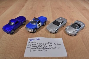 Maisto 4 coches Cadillac EVOQ, Chevy SSR, Pronto Spider, Ford Serie F (300-140) - Imagen 1 de 8