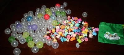 Lote de Squinkies - 90 Figuras de Borracha com 83 Bolas Cápsulas e Bolsa Disney Animais Pessoas - Imagem 1 de 2