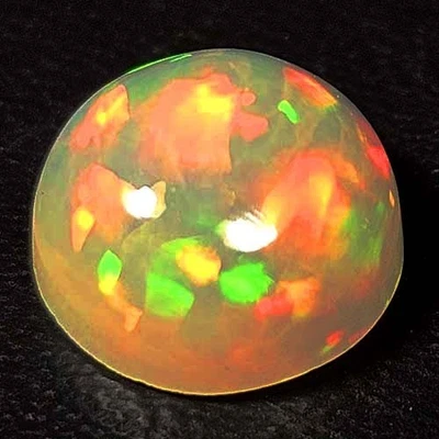 NATURAL AAA+ VVS AMAZING COLOR PLAY ROUND CABOCHAN ETHIOPIAN WELO OPAL 1.40 CTS - Image 1 of 3