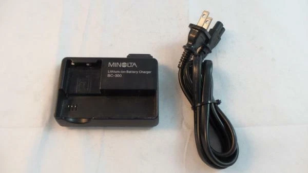 Cargador de batería de iones de litio Minolta BC-300 para cámaras Dimage X Xi Xt (8700-152) Foto 1 de 1