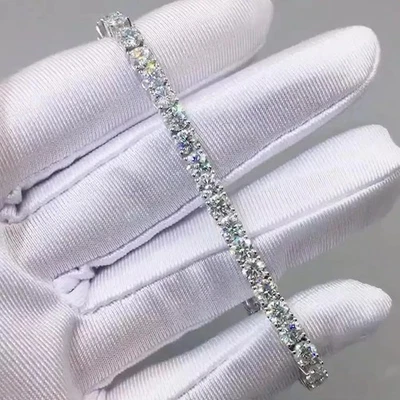 Brazalete de tenis para boda de diamantes simulados de corte redondo de 7 quilates enchapado en oro blanco de 14 quilates Foto 1 de 4