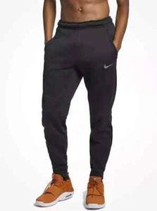 Pantalones deportivos Nike Training Therma-Fit cónicos (negro) (medio) - Imagen 1 de 2