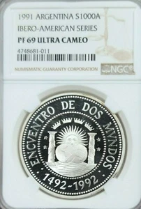 1991 ARGENTINA SILVER 1000 AUSTRALES IBERO PILLARS NGC PF 69 ULTRA CAMEO SCARCE - Picture 1 of 3