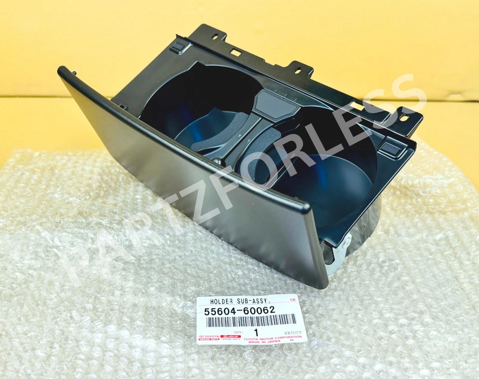 55604-60062 TOYOTA Land Cruiser SOPORTE SUBCONJUNTO, PANEL DE INSTRUMENTOS TAZA NUEVO OEM Foto 1 de 4