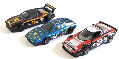 3 Burago Rally Cars Ferrari, Lancia Stratos BMW 1 Hf Rally Pirelli  1/43 1:43 - Image 1 of 4