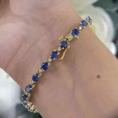 10 Ct Oval Cut Lab-Created Sapphire Women Tennis Bracelet 14k Yellow Gold Plated Foto 1 de 4