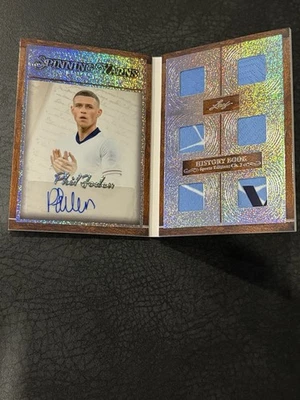 Libro de historia Leaf 2025 Phil Foden automático juego usado mem hilados giratorios SP # 3/3 Foto 1 de 4