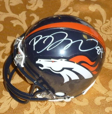 BRANDON LLOYD - WR - Denver Broncos - Autographed Mini Helmet with BDS COA #1958 - Image 1 of 3